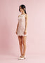 The Poise Mini in Amber Pink