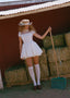 The Knit Backless Puff Dress in White