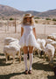 The Knit Backless Puff Dress in White